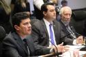 O governador Carlos Massa Ratinho Junior e o ministro da Justiça Sergio Moro, participaram da Encontro do Conselho Nacional de Secretários de Estado da Justiça, Cidadania, Direitos Humanos e Administração Penitenciária, que realiza-se no Palácio Iguaçu. Participaram: os secretários: de Segurança Pública, cel. Romulo Marinho Soares; entre outros.Curitiba, 04-10-19.Foto: Arnaldo Alves / AEN.