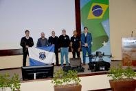 Pessoas sentada no auditório